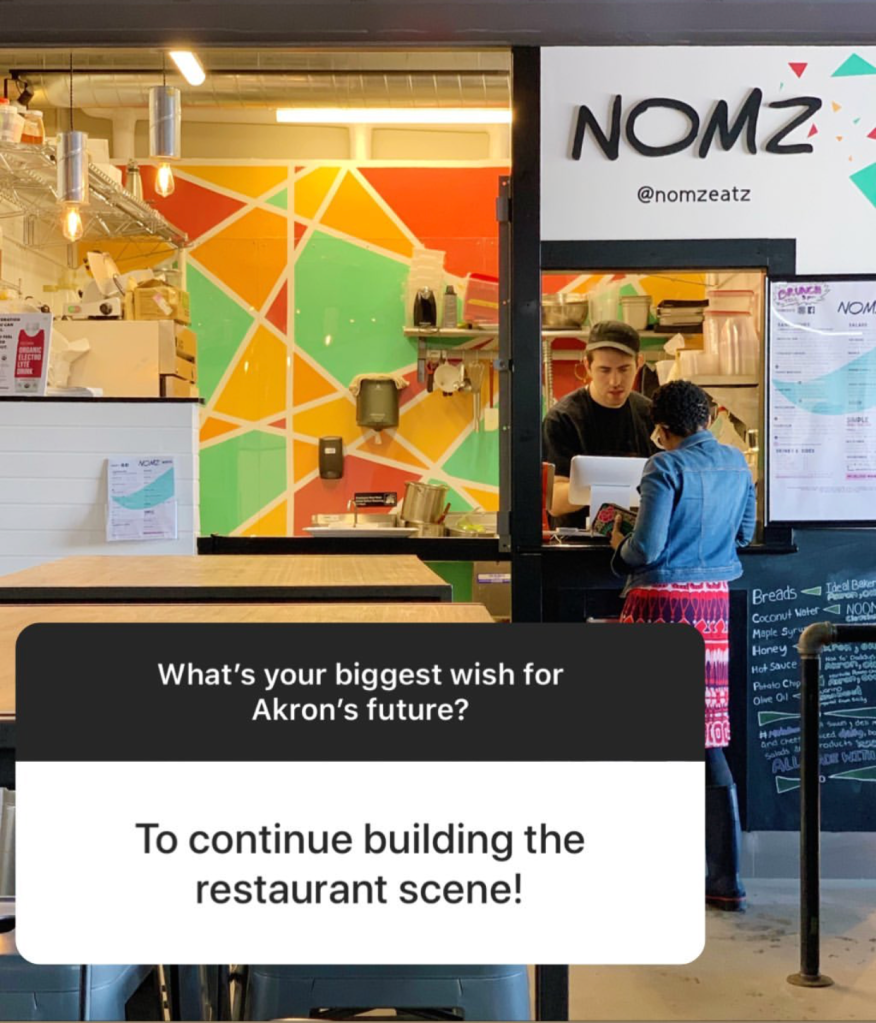 Screenshot of an Instagram Story answer that reads: "To continue building the restaurant scene!" with an image of Nomz Eatz in the background